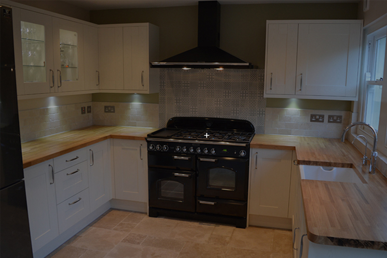 White shaker kitchen with wood worktop - real installed